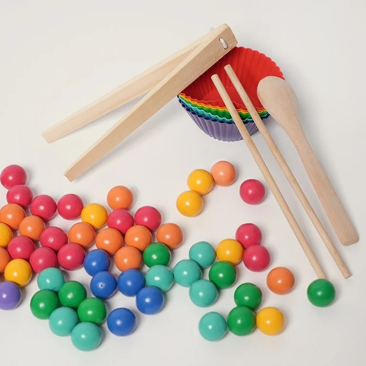 Montessori-rijgset met 77 regenboogkralen