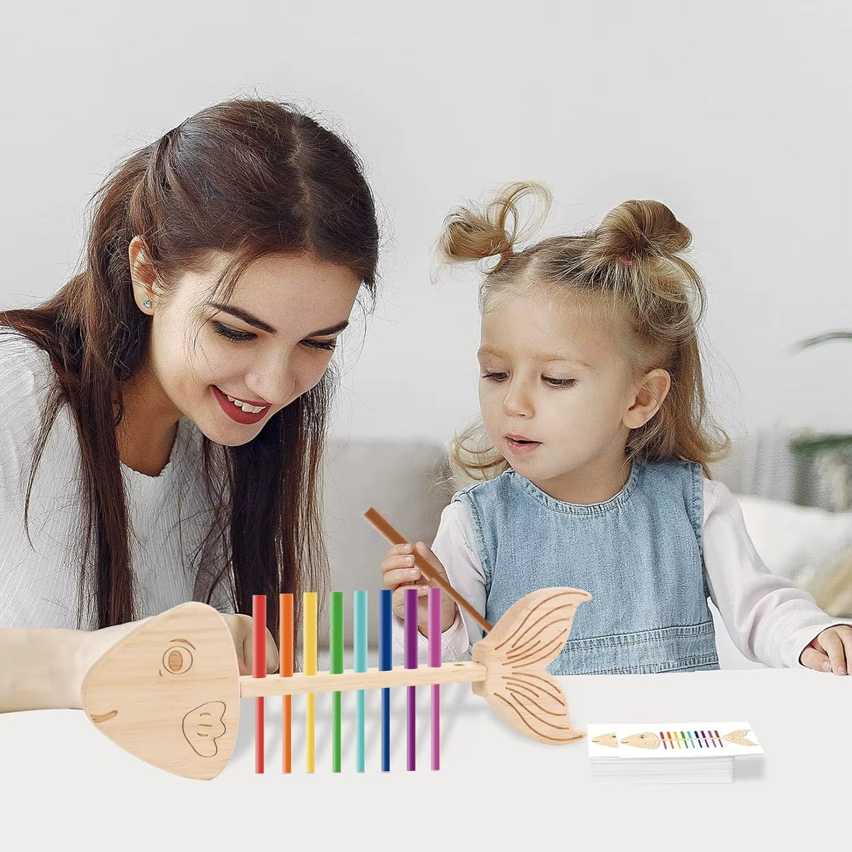 Montessori-visgraatpuzzel met gekleurde staafjes