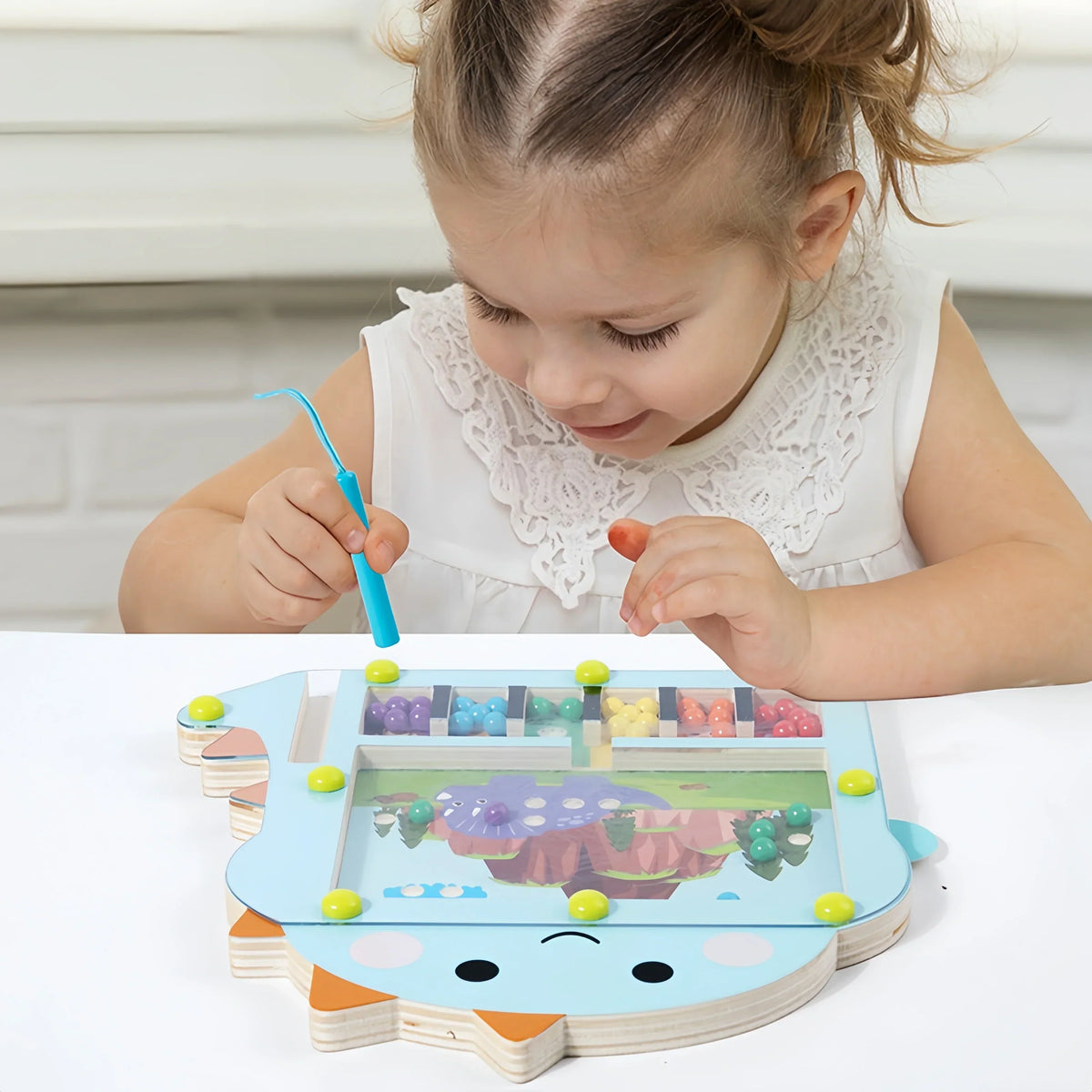 Montessori-magneetspel met dinosauruskaarten