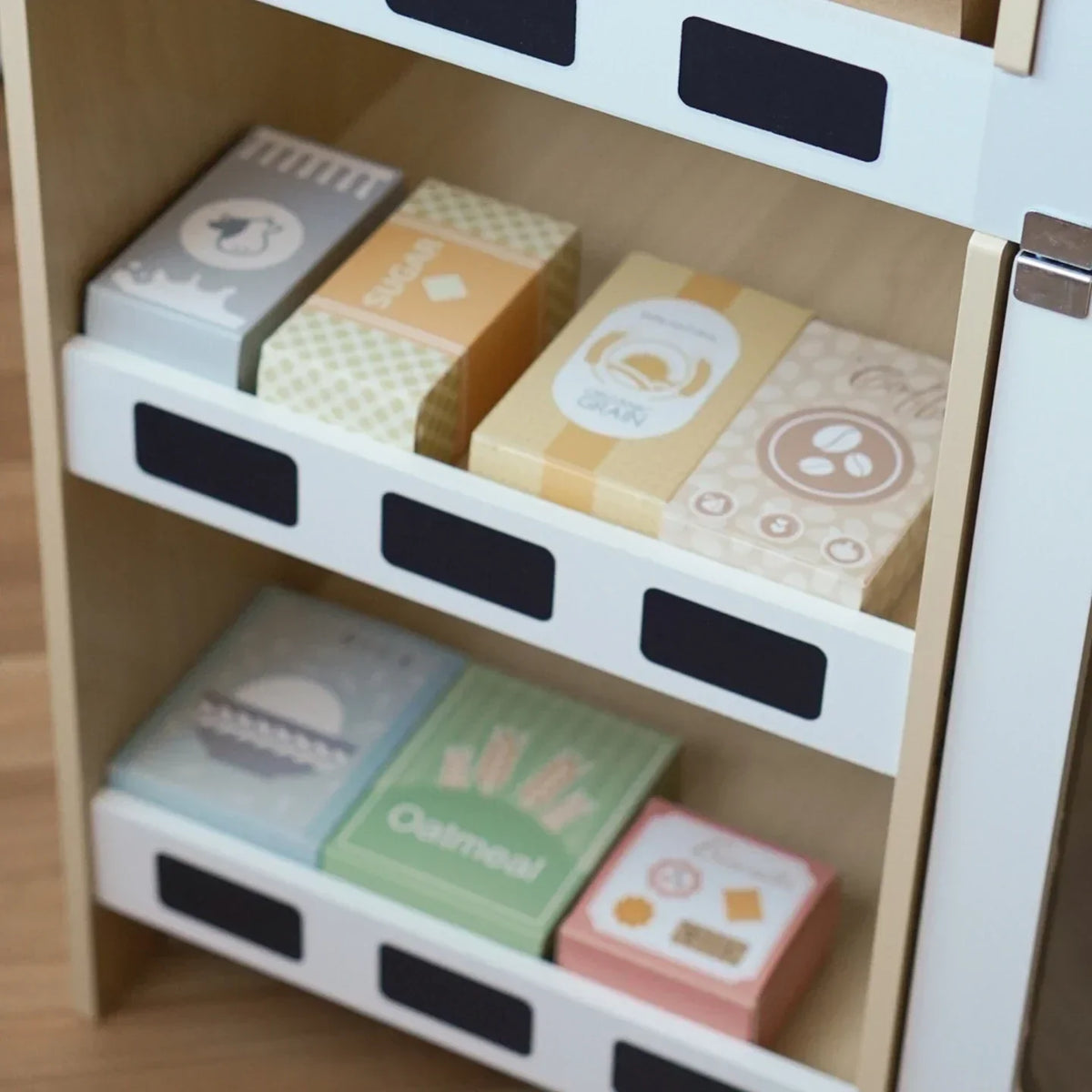 Montessori-marktkraam met kassa