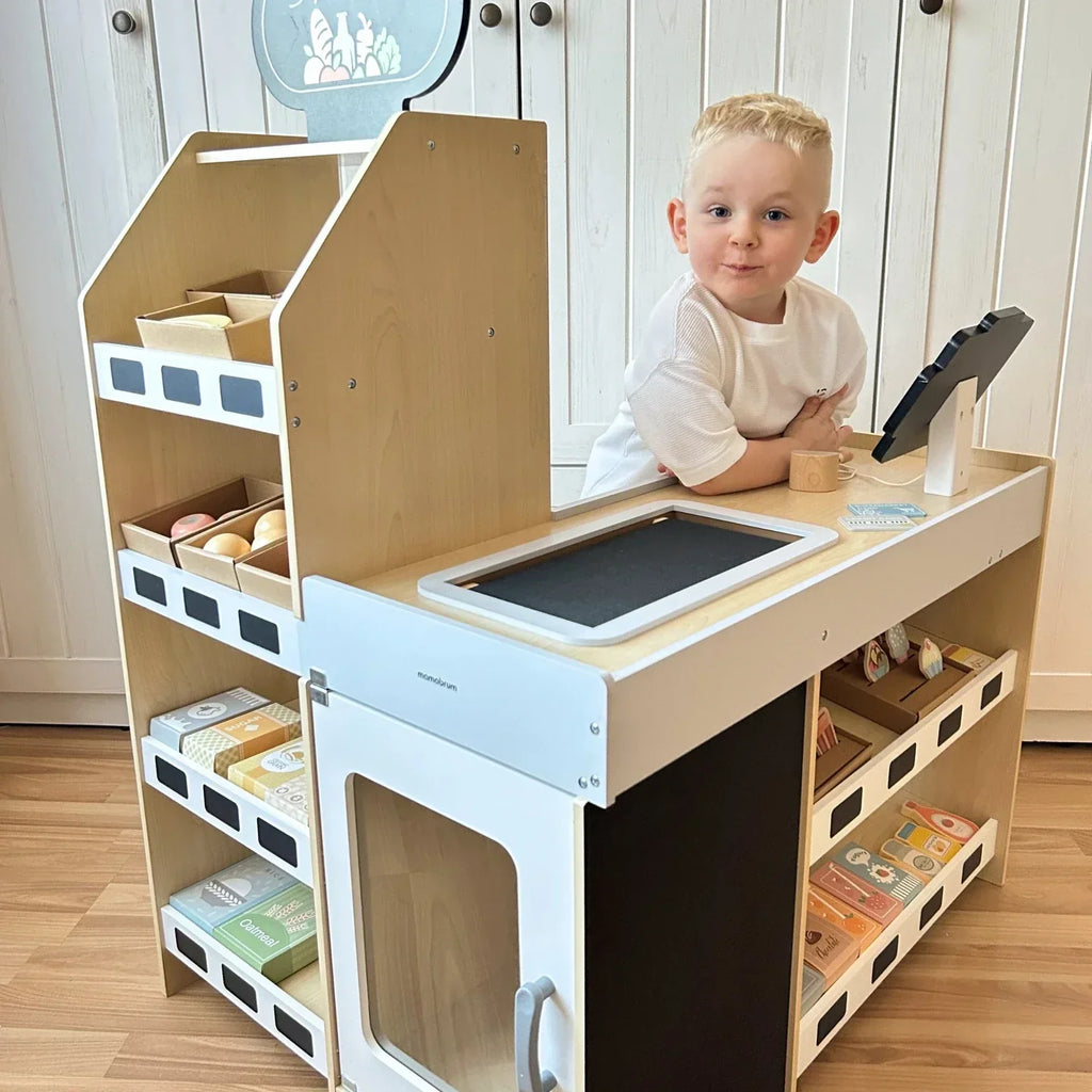 Montessori-marktkraam met kassa