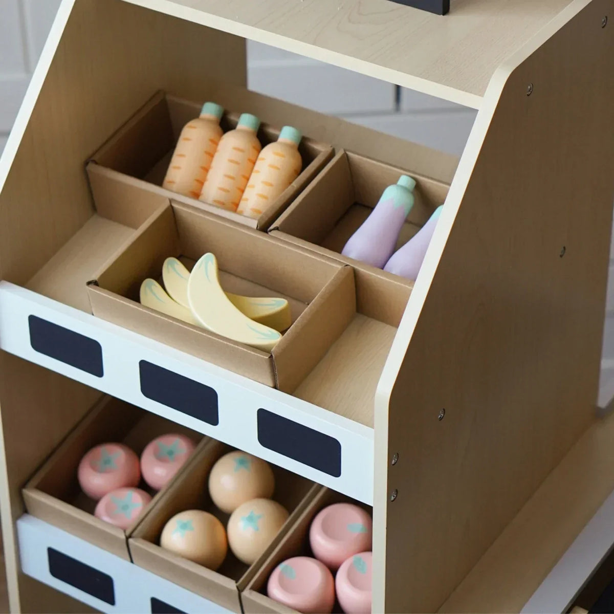Montessori-marktkraam met kassa
