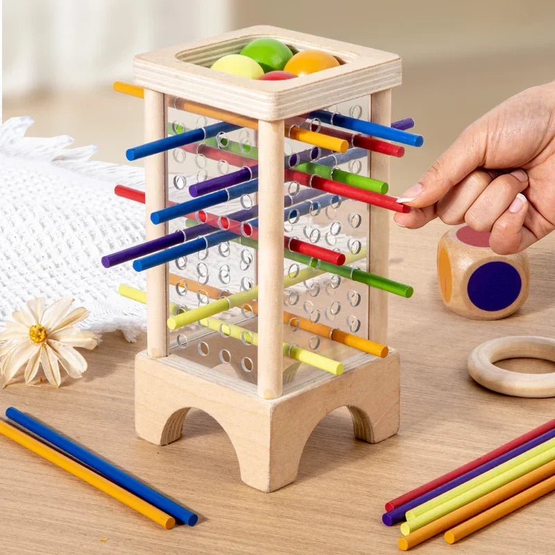 Montessori-kogeltoren met gekleurde staafjes