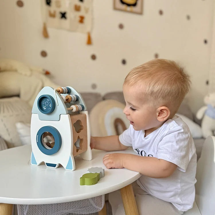 Montessori-leerraket met motoriekspelletjes
