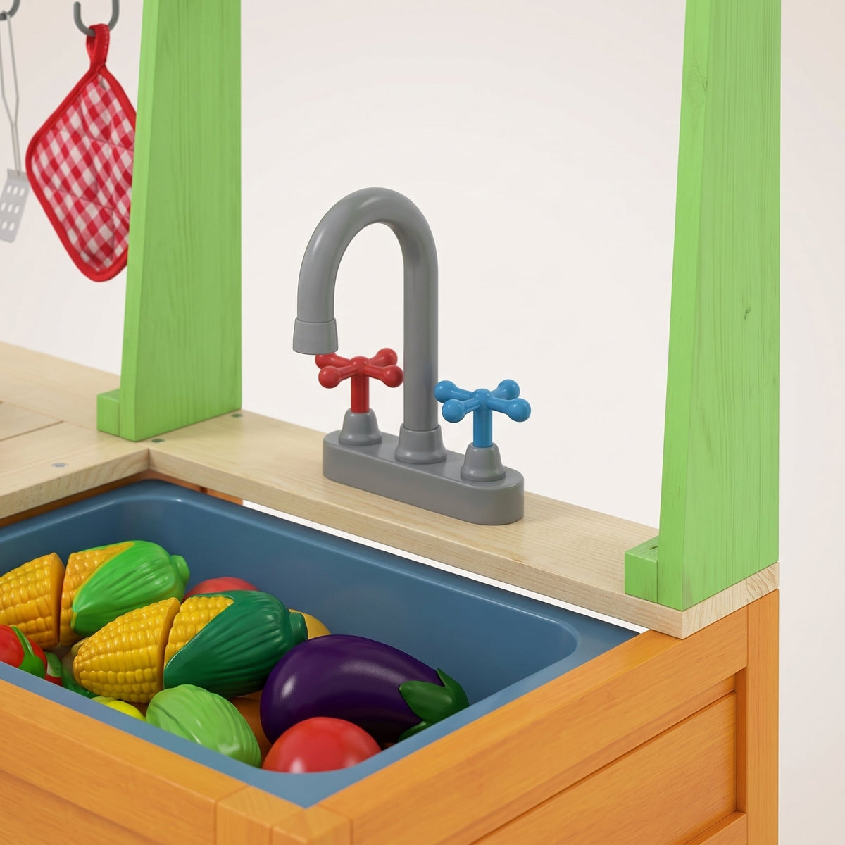 Montessori-buitenkeuken met plantgedeelte